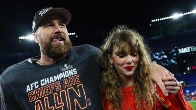 BALTIMORE, MARYLAND - JANUARY 28: Travis Kelce #87 of the Kansas City Chiefs (L) celebrates with Taylor Swift after defeating the Baltimore Ravens in the AFC Championship Game at M&T Bank Stadium on January 28, 2024 in Baltimore, Maryland. (Getty Images via AFP)