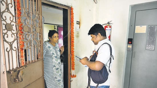 Mumbai, India, Jan 23, 2024 - Government officials conducting a door to door survey in Mumbai, gathering empirical data to establish the backwardness of the Maratha Community. Chief Minister Eknath Shinde announced it on Saturday. Shinde directed the State administration to carry out this survey which covers Maratha and non-Maratha open categories. The BMC has deployed over 10 thousand officers and staff to conduct the survey. Jan 23, 2024. (Photo by Raju Shinde/HT Photo)