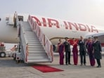 Air India CEO and MD Campbell Wilson with cabin and cockpit crew in New Delhi. (PTI Photo)