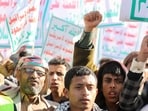 People supporting the Houthis shout slogans as they attend a rally against the U.S.-led strikes on Houthi targets and continued Israeli strikes in the Gaza Strip, in Sanaa, Yemen January 26, 2024. 