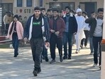 Students coming out of the examination centre after appearing in JEE exam in Ludhiana. (HT)