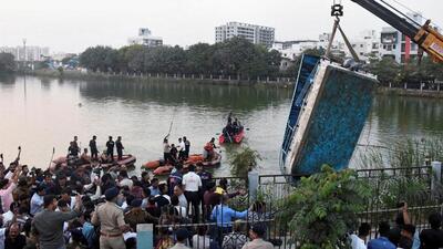 A crane pulls out the boat which capsized in Harni Lake carrying children and teachers who were on a picnic, in Vadodara. (Reuters photo) A crane pulls out the boat which capsized in Harni Lake carrying children and teachers who were on a picnic, in Vadodara. (Reuters photo)
