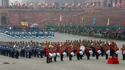 The ceremony commenced with the massed band's 'Shankhnaad' tune, followed by enthralling tunes such as 'Veer Bharat,' 'Sangam Dur,' 'Deshon ka Sartaj Bharat,' 'Bhagirathi,' and 'Arjuna' performed by the Pipes and Drums band. The CAPF bands presented 'Bharat Ke Jawan' and 'Vijay Bharat,' among other stirring numbers. (X/@rajnathsingh) The ceremony commenced with the massed band's 'Shankhnaad' tune, followed by enthralling tunes such as 'Veer Bharat,' 'Sangam Dur,' 'Deshon ka Sartaj Bharat,' 'Bhagirathi,' and 'Arjuna' performed by the Pipes and Drums band. The CAPF bands presented 'Bharat Ke Jawan' and 'Vijay Bharat,' among other stirring numbers. (X/@rajnathsingh)