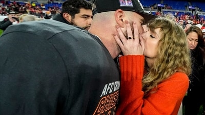 Taylor Swift kisses Kansas City Chiefs tight end Travis Kelce after an AFC Championship NFL football game against the Baltimore Ravens, Sunday, Jan. 28, 2024, in Baltimore. The Kansas City Chiefs won 17-10. (AP) Taylor Swift kisses Kansas City Chiefs tight end Travis Kelce after an AFC Championship NFL football game against the Baltimore Ravens, Sunday, Jan. 28, 2024, in Baltimore. The Kansas City Chiefs won 17-10. (AP)