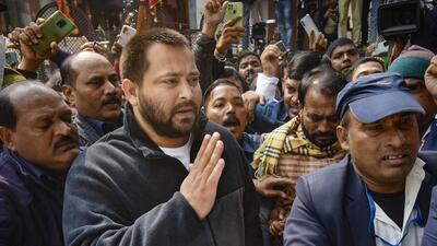 Former Bihar deputy chief minister Tejashwi Yadav at the ED office. (PTI) Former Bihar deputy chief minister Tejashwi Yadav at the ED office. (PTI)