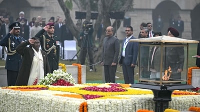 President Droupadi Murmu pays her respect at the Mahatma Gandhi memorial at Rajghat on Gandhi's death anniversary in New Delhi. (AFP) President Droupadi Murmu pays her respect at the Mahatma Gandhi memorial at Rajghat on Gandhi's death anniversary in New Delhi. (AFP)