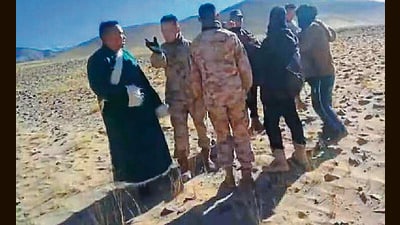 PLA soldiers arguing with Indian shepherds at Chushul. (HT Photo) PLA soldiers arguing with Indian shepherds at Chushul. (HT Photo)
