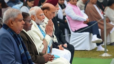 Alongside PM Modi, other dignitaries including President Droupadi Murmu, Vice President Jagdeep Dhankhar, and Defence Minister Rajnath Singh paid floral tributes to Mahatma Gandhi. (PTI) Alongside PM Modi, other dignitaries including President Droupadi Murmu, Vice President Jagdeep Dhankhar, and Defence Minister Rajnath Singh paid floral tributes to Mahatma Gandhi. (PTI)