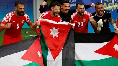 Jordan's Yazan Al Arab, Ehsan Haddad and teammates celebrate after the match (REUTERS)