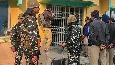 Security personnel guard outside TMC leader Sheikh Shahjahan's house at Sandeshkhali in North 24 Parganas district on January 24 (PTI)