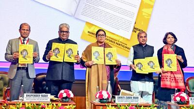 Union ministers Smriti Irani and Bhupender Yadav release a booklet during the 'Women in the Workforce for Viksit Bharat' event, in New Delhi on Tuesday (ANI)