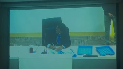 Screengrab of video shared by AAP alleging that the presiding officer made tick marks on some ballots.
