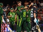 Pakistan's T20I captain Shaheen Shah Afridi (C) celebrates with former captain Babar Azam after the wicket of New Zealand's Tim Seifert during NZ T20I series Pakistan's T20I captain Shaheen Shah Afridi (C) celebrates with former captain Babar Azam after the wicket of New Zealand's Tim Seifert during NZ T20I series