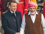 French President Emmanuel Macron being received by Prime Minister Narendra Modi upon his arrival to attend the 75th Republic Day ceremony, in New Delhi (PTI)