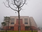 Interim Budget 2024: A bird flies towards a tree near the new Parliament building, in the morning fog on the first day of its budget session in New Delhi. Interim Budget 2024: A bird flies towards a tree near the new Parliament building, in the morning fog on the first day of its budget session in New Delhi.