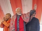 A scrap merchant in Gujarat installed PM Modi and Yogi's statue on the rooftop of his building. A scrap merchant in Gujarat installed PM Modi and Yogi's statue on the rooftop of his building.