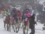 Many tourists were seen enjoying the snowfall in the hill resort of Kufri.&nbsp;(HT Photo/Deepak Sansta)