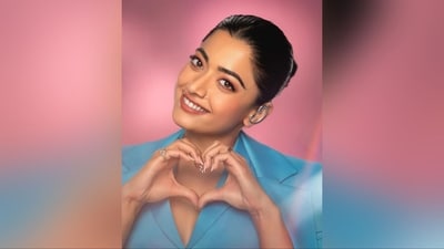 With the assistance of hairstylist Priyanka Borkar, Rashmika elegantly arranged her luscious locks into a tidy bun, complementing her stylish appearance. She concluded her look by forming a heart sign with her hands. (Instagram/@rashmika_mandanna) With the assistance of hairstylist Priyanka Borkar, Rashmika elegantly arranged her luscious locks into a tidy bun, complementing her stylish appearance. She concluded her look by forming a heart sign with her hands. (Instagram/@rashmika_mandanna)