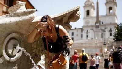 A woman cools off at Fontana della Barcaccia at the Spanish Steps in Rome during a heatwave across Italy in July, 2023. (Reuters) A woman cools off at Fontana della Barcaccia at the Spanish Steps in Rome during a heatwave across Italy in July, 2023. (Reuters)