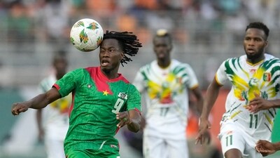 Burkina Faso's Issa Kabore controls the ball in the air during the African Cup of Nations round of 16 soccer match between Mali and Burkina Faso, at the Amadou Gon Coulibaly stadium in Korhogo, Ivory Coast (AP) Burkina Faso's Issa Kabore controls the ball in the air during the African Cup of Nations round of 16 soccer match between Mali and Burkina Faso, at the Amadou Gon Coulibaly stadium in Korhogo, Ivory Coast (AP)