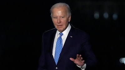 President Joe Biden waves as he walks across the South Lawn of the White House in Washington, Tuesday, Jan. 30, 2024, after returning from a trip to Florida (AP Photo/Susan Walsh) (AP) President Joe Biden waves as he walks across the South Lawn of the White House in Washington, Tuesday, Jan. 30, 2024, after returning from a trip to Florida (AP Photo/Susan Walsh) (AP)