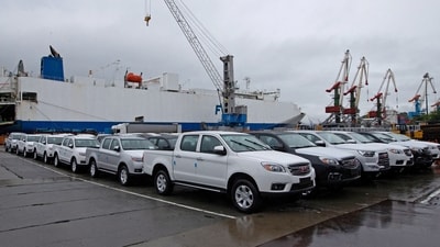 FILE PHOTO: A view shows new cars produced by Chinese automaker JAC unloaded from a ship at a commercial port in Vladivostok, Russia (REUTERS)
