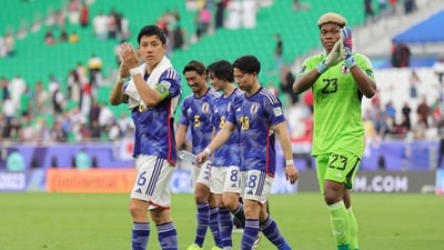 Japan's players greet their supporters after the Qatar 2023 AFC Asian Cup football match against Bahrain (AFP) Japan's players greet their supporters after the Qatar 2023 AFC Asian Cup football match against Bahrain (AFP)