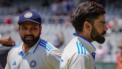 Indian captain Rohit Sharma with teammate Virat Kohli (PTI) Indian captain Rohit Sharma with teammate Virat Kohli (PTI)