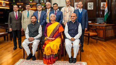 New Delhi: Union Finance Minister Nirmala Sitharaman with Ministers of State Pankaj Chaudhary and Bhagwat Karad and her team of officials a day before presentation of the Interim Budget 2024, at her North Block office in New Delhi, Wednesday, Jan. 31, 2024. (PTI Photo/Atul Yadav) New Delhi: Union Finance Minister Nirmala Sitharaman with Ministers of State Pankaj Chaudhary and Bhagwat Karad and her team of officials a day before presentation of the Interim Budget 2024, at her North Block office in New Delhi, Wednesday, Jan. 31, 2024. (PTI Photo/Atul Yadav)