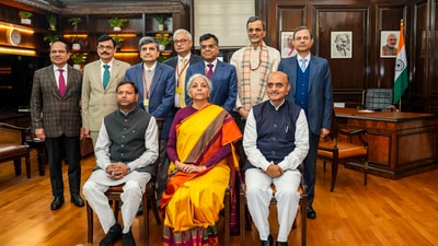 New Delhi: Union Finance Minister Nirmala Sitharaman with Ministers of State Pankaj Chaudhary and Bhagwat Karad and her team of officials a day before presentation of the Interim Budget 2024, at her North Block office in New Delhi, Wednesday, Jan. 31, 2024. (PTI Photo/Atul Yadav) New Delhi: Union Finance Minister Nirmala Sitharaman with Ministers of State Pankaj Chaudhary and Bhagwat Karad and her team of officials a day before presentation of the Interim Budget 2024, at her North Block office in New Delhi, Wednesday, Jan. 31, 2024. (PTI Photo/Atul Yadav)