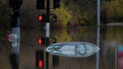 Heavy rainfall around the U.S. on Monday prompted first responders in Texas to conduct water rescues and officials in California to issue evacuation warnings over potential mudslides in parts of Los Angeles County. (AP Photo/Gregory Bull) (AP)