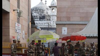 Police personnel stand guard near the Gyanvapi mosque in Varanasi on Wednesday. (AFP) Police personnel stand guard near the Gyanvapi mosque in Varanasi on Wednesday. (AFP)