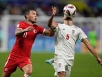 Hong Kong's Everton Camargo, left, and Iran's Milas Mohammadikeshmarzi vie for the ball during the Asian Cup Group C soccer match between Hong Kong and Iran at Khalifa International Stadium in Doha, Qatar Hong Kong's Everton Camargo, left, and Iran's Milas Mohammadikeshmarzi vie for the ball during the Asian Cup Group C soccer match between Hong Kong and Iran at Khalifa International Stadium in Doha, Qatar