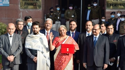 In the third budget presentation in 2021, Nirmala Sitharaman wore a red and off-white Pochampally saree, which originates from Pochampally village in Hyderabad. (HT Photo/Ajay Aggarwal) In the third budget presentation in 2021, Nirmala Sitharaman wore a red and off-white Pochampally saree, which originates from Pochampally village in Hyderabad. (HT Photo/Ajay Aggarwal)