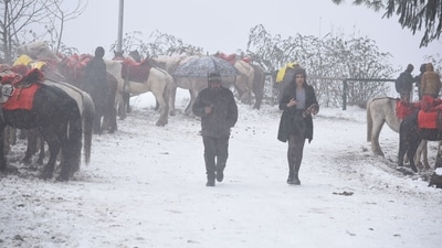 In Jammu and Kashmir, numerous areas in the higher reaches, including those along the Zojila axis on the Srinagar-Leh highway, experienced fresh snowfall, while the plains were lashed by rains.&nbsp; (HT Photo/Deepak Sansta)