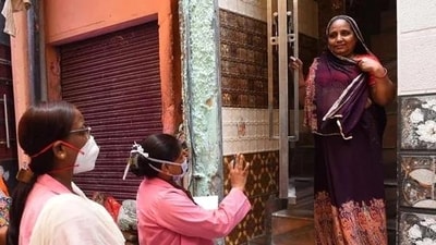 ASHAs, a workforce of over one million accredited female health workers, act as a crucial link between the community and the public health system in India. (HT File)