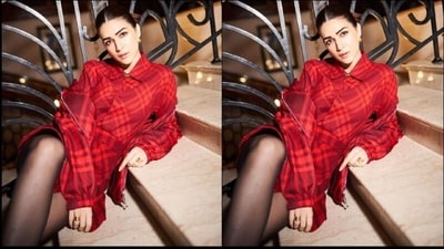 Kriti's outfit features a collar neckline, full sleeves, a front button closure, a belt at the waist, buttoned cuffs and a medium-weight poplin fabric. The chic red checked print that adorns her dress all over elevates her entire outfit and adds a trendy vibe to her look. (Instagram/@sukritigrover) Kriti's outfit features a collar neckline, full sleeves, a front button closure, a belt at the waist, buttoned cuffs and a medium-weight poplin fabric. The chic red checked print that adorns her dress all over elevates her entire outfit and adds a trendy vibe to her look. (Instagram/@sukritigrover)