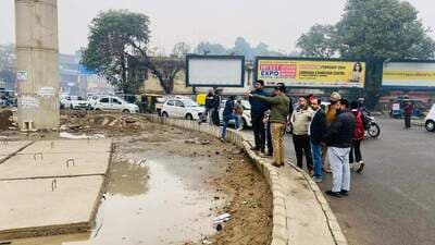 Officials inspecting Bharat Nagar Chowk in Ludhiana. (HT)
