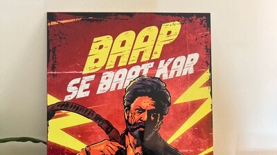 The frame showed Shah Rukh Khan's image emblazoned with the popular dialogue from the movie, “Baap se baat kar.”