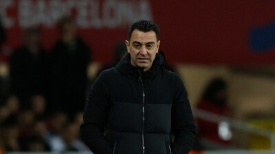 FC Barcelona coach Xavi reacts (REUTERS)