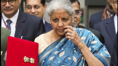 Union Finance Minister Nirmala Sitharaman and other officials outside the Finance Ministry ahead of the presentation of Interim Budget in New Delhi (PTI)
