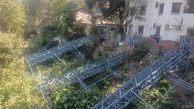 While the civic officials claimed that the hoarding was located on private land, it was later found to be put on PMC-owned property. (HT PHOTO)