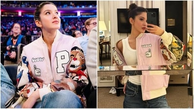 On Thursday, Shanaya took to Instagram and uploaded a series of pictures accompanied by the caption "Childhood bucket list". In the post, she is seen exuding chic vibes in a light pink puffer jacket featuring graphic-printed full sleeves. She paired it with a white tank top and baggy denim trousers. (Instagram/@shanayakapoor02) On Thursday, Shanaya took to Instagram and uploaded a series of pictures accompanied by the caption "Childhood bucket list". In the post, she is seen exuding chic vibes in a light pink puffer jacket featuring graphic-printed full sleeves. She paired it with a white tank top and baggy denim trousers. (Instagram/@shanayakapoor02)