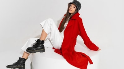 Boots make for a stylish accessory that can help transition your look from day to night (Shutterstock)