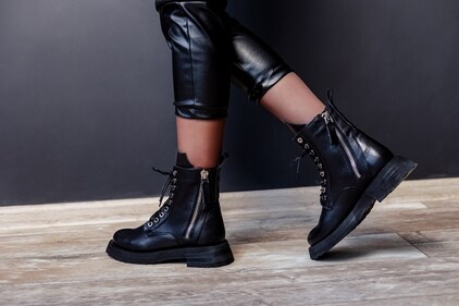 Boots with buckles and zips perfectly rev up biker glam (Shutterstock)