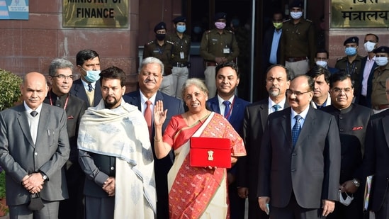 In the third budget presentation in 2021, Nirmala Sitharaman wore a red and off-white Pochampally saree, which originates from Pochampally village in Hyderabad.&nbsp;(HT Photo/Ajay Aggarwal)