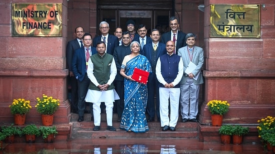 For her sixth budget speech, Nirmala Sitharaman chose to wear a blue-colored tussar silk saree adorned with kantha handiwork, which she paired with a golden-hued blouse.&nbsp;(HT Photo/Sanchit Khanna)