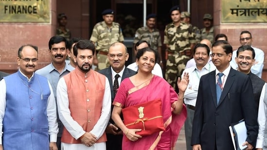 During the Union Budget announcement in 2019, Nirmala Sitharaman made a statement by wearing a Pink Mangalgiri saree with a gold border. This marked the first time she replaced the traditional briefcase with a 'bahi-khata'.&nbsp;(PTI)