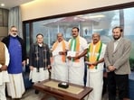 BJP chief JP Nadda welcomes Kerala Janapaksham (Secular) leader P C George, his son Shone George and others as the party merges with the BJP on Wednesday. Union ministers Rajeev Chandrasekhar, V Muraleedharan and others also present. (ANI) BJP chief JP Nadda welcomes Kerala Janapaksham (Secular) leader P C George, his son Shone George and others as the party merges with the BJP on Wednesday. Union ministers Rajeev Chandrasekhar, V Muraleedharan and others also present. (ANI)