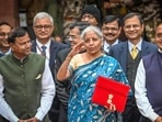 Finance minister Nirmala Sitharaman leaves the finance ministry ahead of the presentation of the interim budget in Parliament. (Sanchit Khanna/HT)